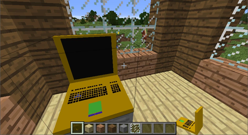 Zdjęcie z modyfikacji w Minecraft dodająca laptopa